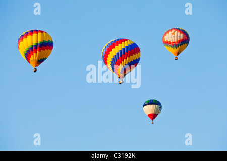 Hot air balloons flying over Albuquerque, New Mexico during the 2010 Hot Air Balloon Festival (Fiesta). Stock Photo