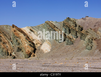 Eroded desert hillsides showing layers of colorful rocks - California USA Stock Photo