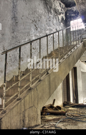 Discarded building, stair after fire Stock Photo