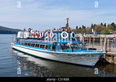 Tourists on an excursion boat in Bowness, Lake Windermere, Lake District National Park, Cumbria, UK Stock Photo