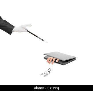 A hand holding a magic wand, keys and laptop isolated on white Stock Photo