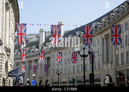 Union Jack flags and bunting flying above Regent Street for the Royal Wedding, London, UK Stock Photo