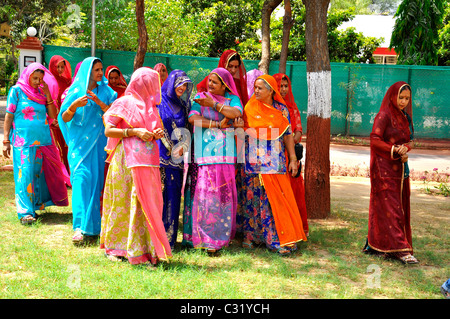 Indian women from Rajasthan wearing traditional colorful dresses Stock Photo