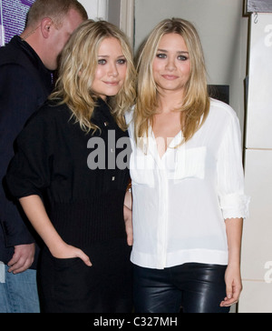 Mary Kate Olsen and Ashley Olsen The Olsen twins sign their new book 'Influence' at Barnes & Noble New York City, USA - Stock Photo