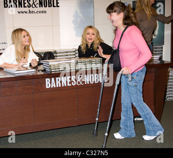 Ashley Olsen and Mary Kate Olsen The Olsen twins sign their new book 'Influence' at Barnes & Noble New York City, USA - Stock Photo