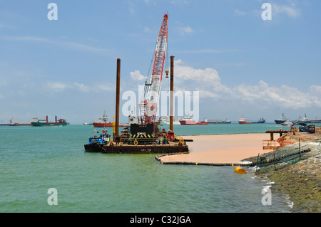 Land Reclamation in Progress to expand Singapore Stock Photo