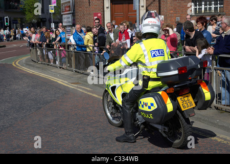 psni police motorcycle traffic control officer escort during parade in bangor county down northern ireland Stock Photo