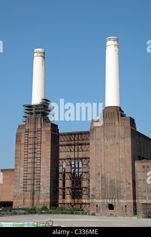 View of two chimneys of the decommissioned coal-fired powered Battersea Power Station, South London, UK. Stock Photo
