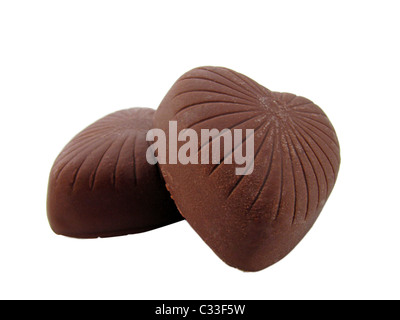 two chocolate hearts isolated on white Stock Photo