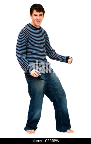 Happy young man dancing and posing isolated over white Stock Photo