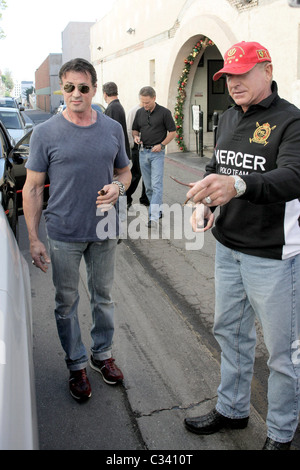 Sylvester Stallone and Frederic Prince Von Anhalt Frederic Prince Von Anhalt pulls up in his new Drop-Top Rolls Royce Phantom Stock Photo