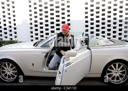 Frederic Prince Von Anhalt pulls up in his new Drop-Top Rolls Royce Phantom Coupe and shows it off to Sylvester Stallone Los Stock Photo