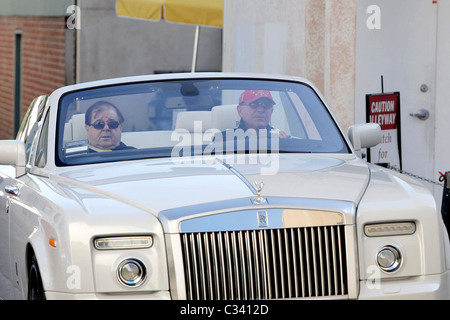 Frederic Prince Von Anhalt pulls up in his new Drop-Top Rolls Royce Phantom Coupe and shows it off to Sylvester Stallone Los Stock Photo