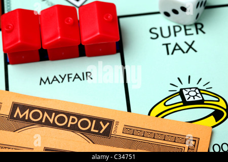 Mayfair and Super Tax on the Monopoly board Stock Photo