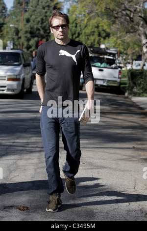 David Duchovny  exits A Votre Sante restaurant after having lunch with a friend Los Angeles, California - 27.01.09 Stock Photo