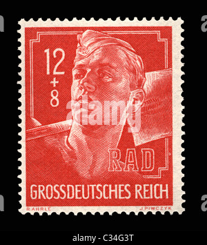 A WW11 German postage stamp showing an RAD labor worker with shovel Stock Photo