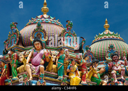 Sri Mariamman Hindu Temple in Singapore - pantheon of painted deities 3 Stock Photo