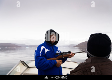 Husband and wife seal hunters, South Greenland Stock Photo