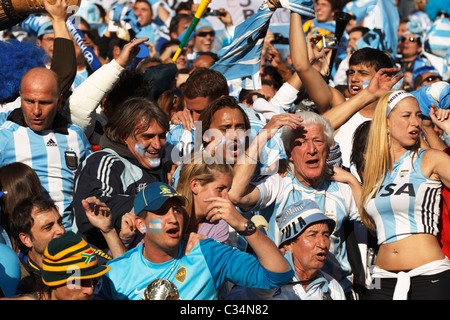 Argentina supporters celebrate after a goal against South Korea during a 2010 FIFA World Cup football match June 17, 2010. Stock Photo