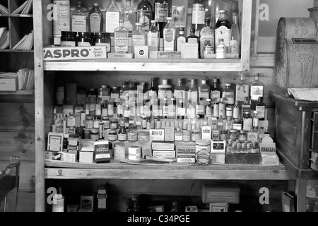 Old medicine bottles in an old pharmacy or general store Stock Photo