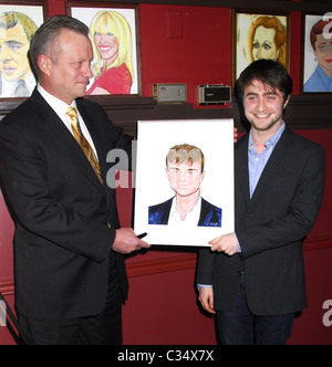 Daniel Radcliffe receives his portrait celebrating his performance in 'Equus' on Broadway at Sardi's New York City, USA - Stock Photo