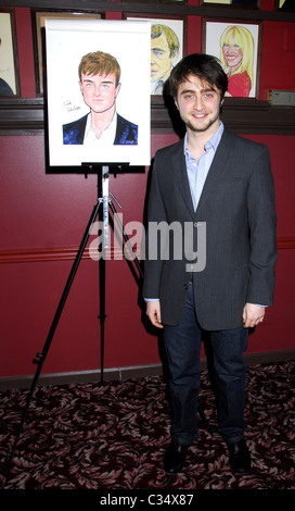 Daniel Radcliffe receives his portrait celebrating his performance in 'Equus' on Broadway at Sardi's New York City, USA - Stock Photo