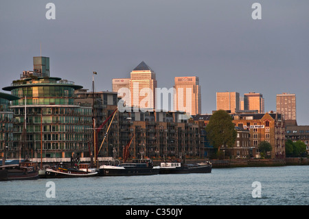 View to Oliver's Wharf and Canary Wharf skyscrapers Wapping London UK Stock Photo