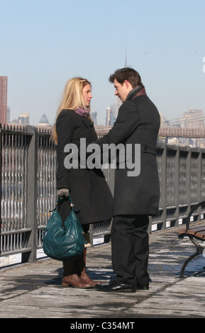 Sarah Lafleur and Eric Mabius filming a scene for 'Ugly Betty' on the