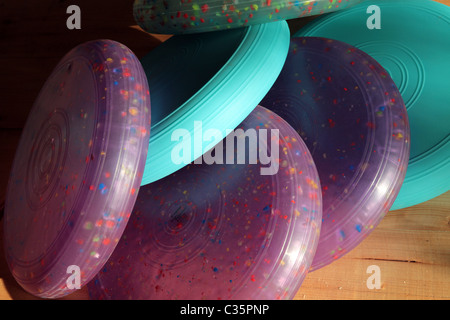 plastic round pillows used for athletics pilates and sports shoot under strong sunlight and shadows Stock Photo