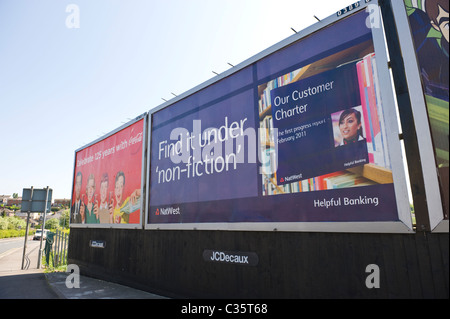 Advertising billboard on JCDECAUX roadside site advert for NATWEST BANK Stock Photo