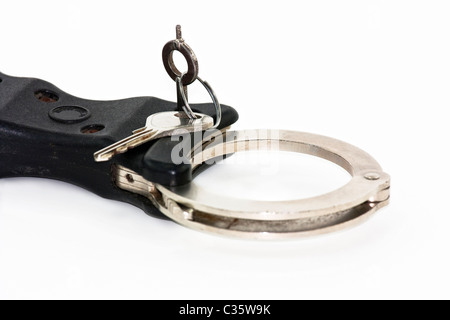 modern UK police handcuffs isolated on white Stock Photo - Alamy