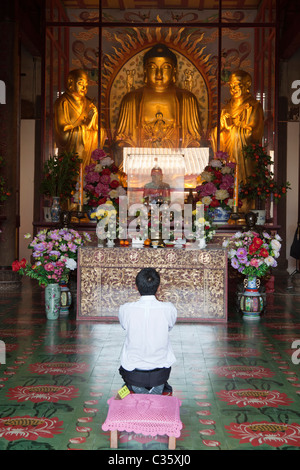 Kek Sok Si Temple, Penang Malaysia- praying man Stock Photo