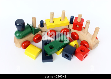 a colorful wooden train toy for children on white paper Stock Photo