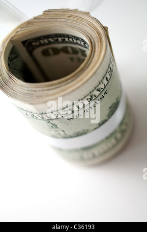 Dollar roll tightened with white ribbon Stock Photo