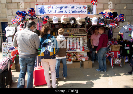 Royal Wedding fans buy souvenirs on the streets of Westminster ahead of the Royal Wedding of Prince William and Kate Middleton. Stock Photo