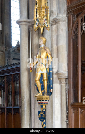 Winchester City Cathedral , ancient capital of Wessex , gilt statue or sculpture St Joan ( Joanna de ) of Arc burnt stake 1429 Stock Photo