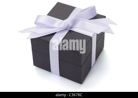 Black gift box with bow ribbon on white backgropund Stock Photo