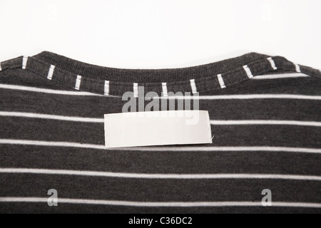 blank t-shirt label on striped texture cloth Stock Photo
