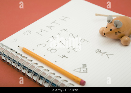 math homework with pencil and wooden toy Stock Photo