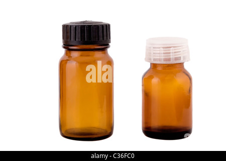 three brown small bottles on white background Stock Photo