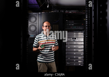 Technician in server room Stock Photo