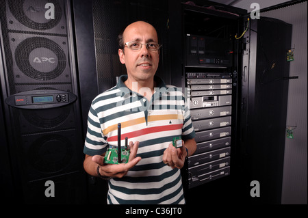 Technician in server room Stock Photo