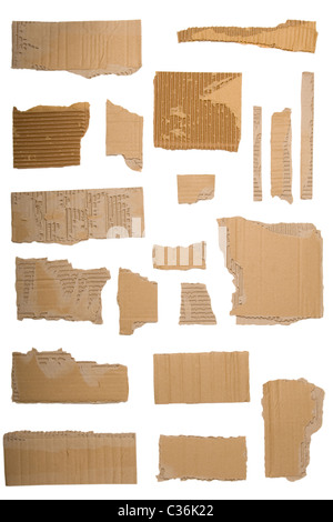 Pieces of torn brown corrugated cardboard, Isolated on White Background Stock Photo