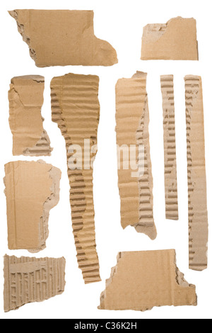 Pieces of torn brown corrugated cardboard, Isolated on White Background Stock Photo