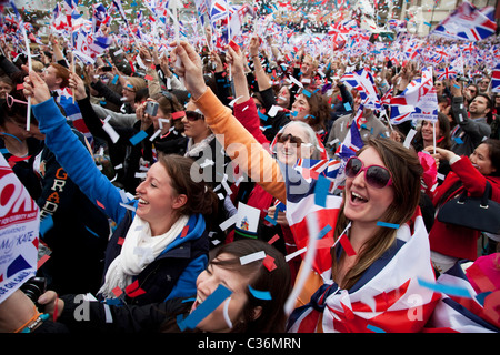 Revelers gather in Trafalgar Square in Central London to celebrate the Royal Wedding of Prince William and Kate Middleton Stock Photo