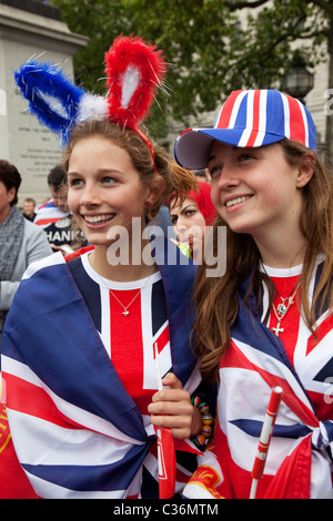 Revelers gather in Trafalgar Square in Central London to celebrate the Royal Wedding of Prince William and Kate Middleton Stock Photo