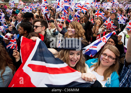 Revelers gather in Trafalgar Square in Central London to celebrate the Royal Wedding of Prince William and Kate Middleton Stock Photo