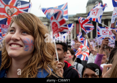 Revelers gather in Trafalgar Square in Central London to celebrate the Royal Wedding of Prince William and Kate Middleton Stock Photo