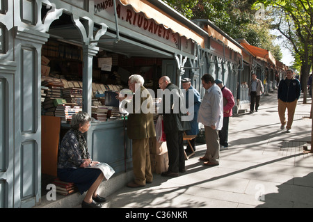 Second hand book stalls in the Cuesta de Claudio Moyano at the bottom end of the Paseo del Prado, Madrid, Spain. Stock Photo
