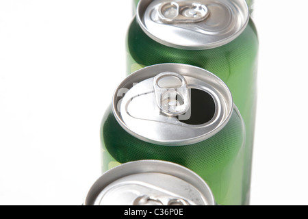 Macro shot of the tops of a bunch of aluminum cans with opened one Stock Photo